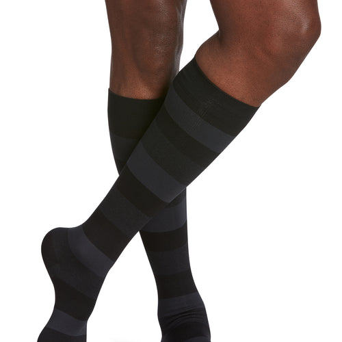 Sigvaris Style Microfibre Patterns men's compression socks in Onyx Stripe, worn by a model