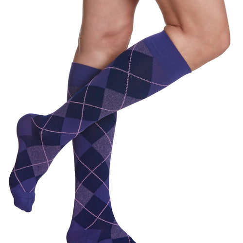 Sigvaris Style Microfibre Patterns women's compression socks in Purple Argyle, worn by a model